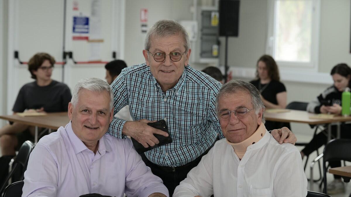 Three men at the Environmental Stewardship’ project