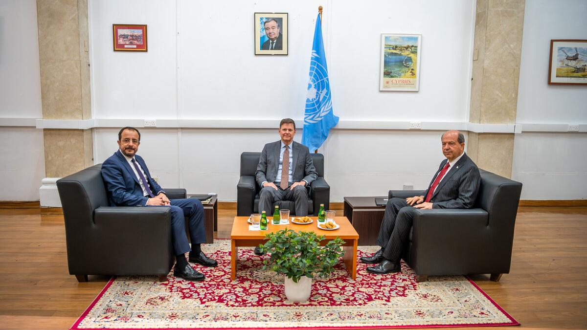 The top United Nations official in Cyprus, Colin Stewart (center), with the Greek Cypriot leader, Nikos Christodoulides (left) and the Turkish Cypriot leader, Ersin Tatar (right).