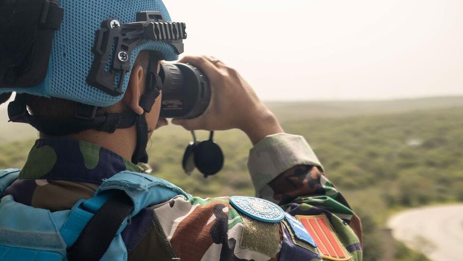 A peacekeeper monitors the Green Hill area in Naqoura, Lebanon.