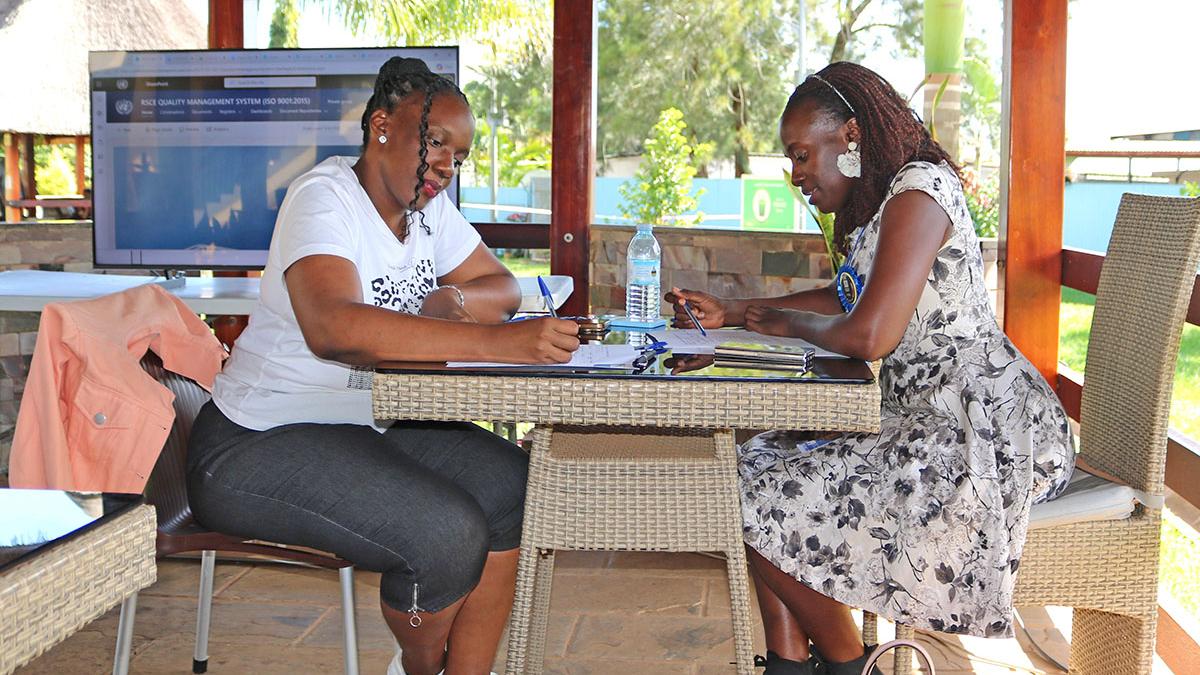 RSCE staff member checks with ISO Consultant on their readiness for the ISO 9001:2015 audit
