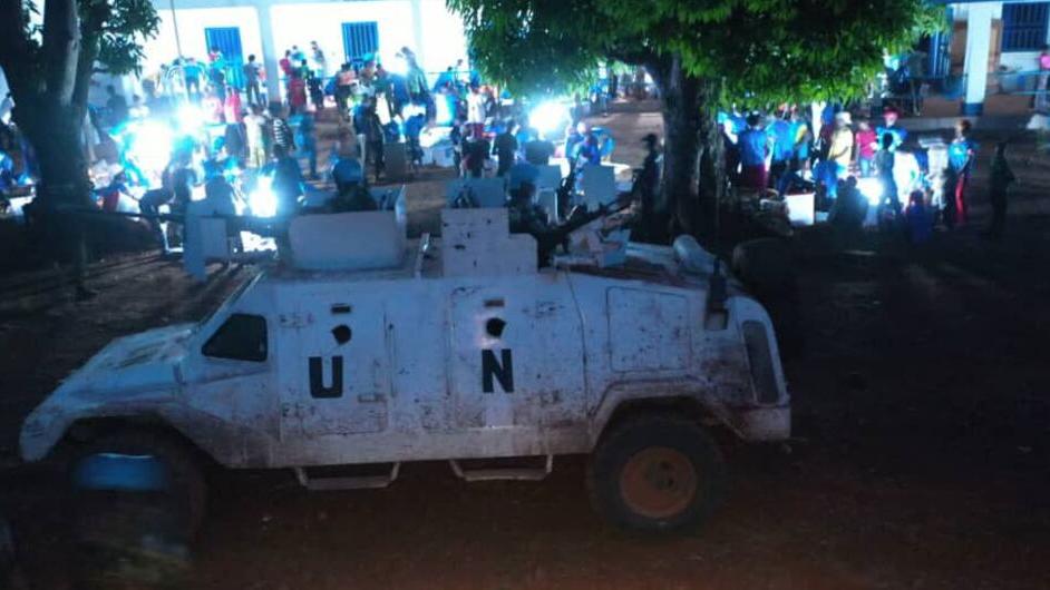 UN vehicle at night.