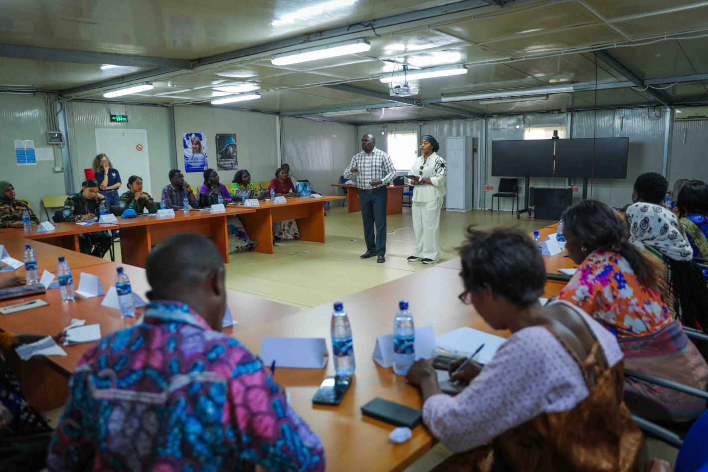 In Bunia, Ituri, women peacebuilders turned their experiences into a powerful collective poem in a workshop led by UN Global Peace Advocate Maryam Bukar Hassan during her visit.
