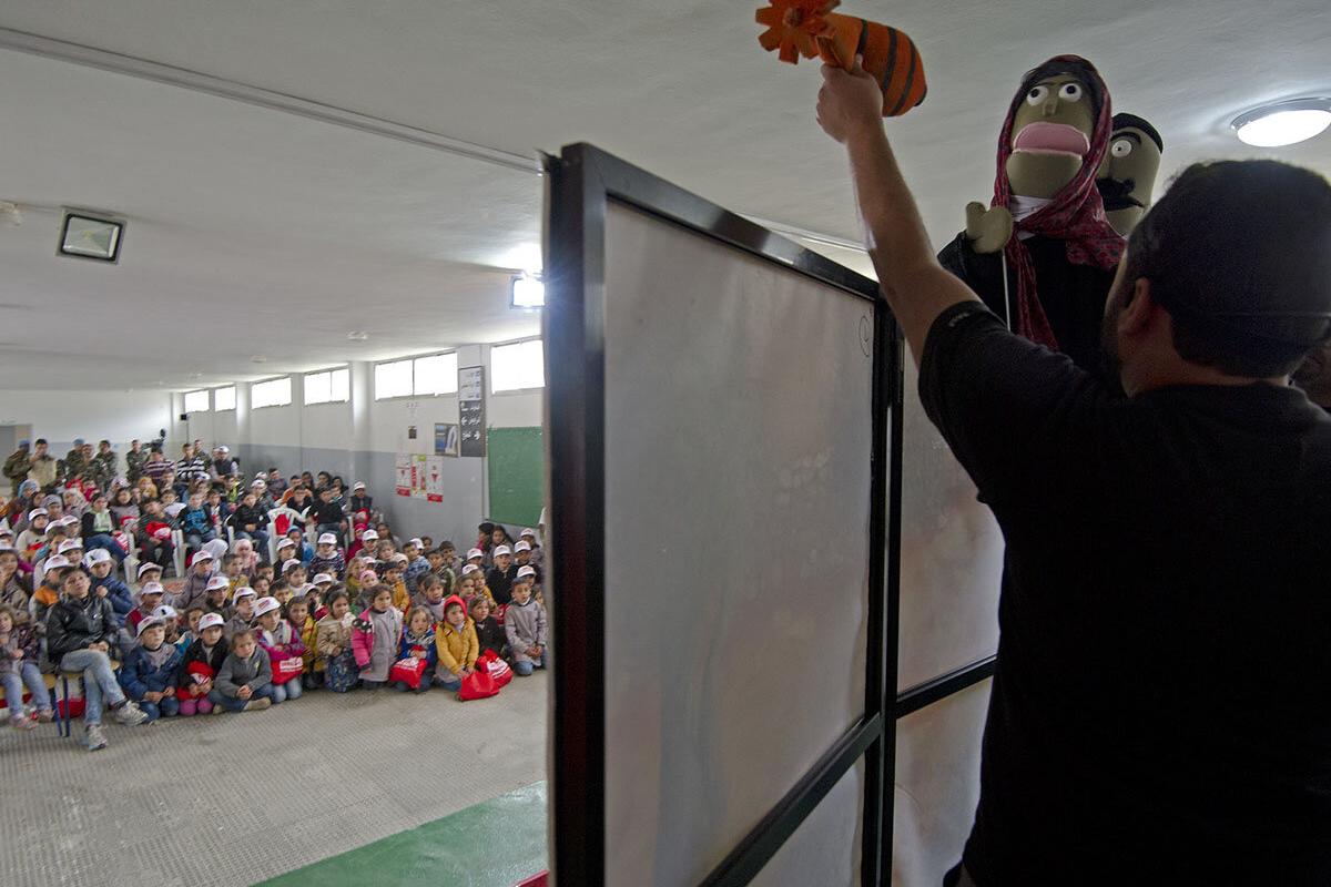 A puppet show for kids acted by MAG at Blat Public School during an MRE event coordinated by the Lebanon Mine Action Center ( LMAC), UNMAS and UNIFIL, as part of its mine risk education activities; and to highlight the danger of unexploded ordnance.