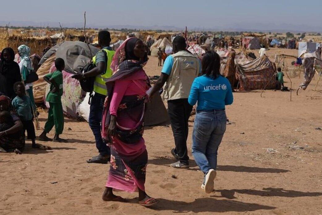 Displaced persons and makeshift shelters at an internally displaced persons camp in Sudan.