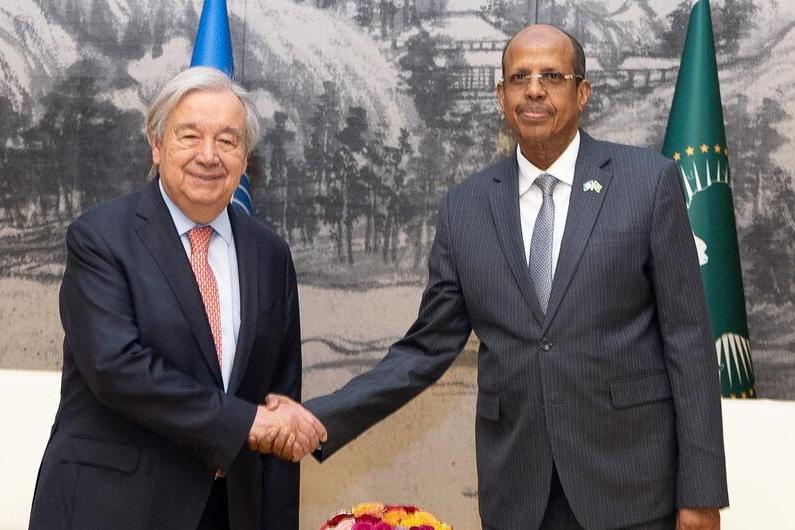 AU Commission Chairperson Mahmoud Ali Youssouf (right), greets Secretary-General António Guterres, in Addis Ababa.