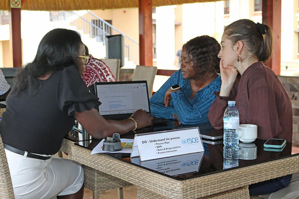 Staff from UNCAP consult with Chief LARRMU,  Elise Metougue on their QMS Policy alignment