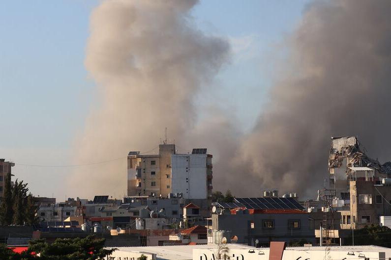 Smoke rises above residential neighborhoods in Tyre, southern Lebanon, following an Israeli airstrike. (file)