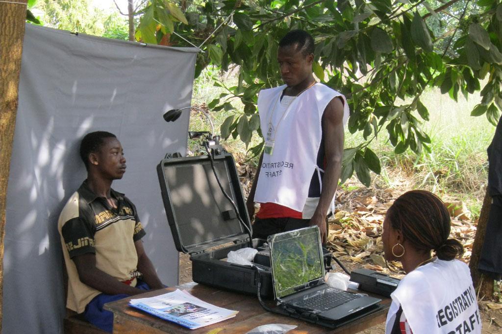 Registration staff operate a booth outside